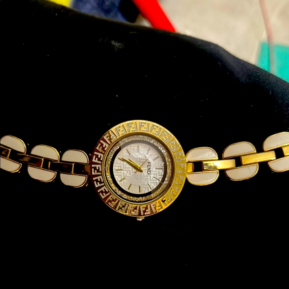 Gold and White Elegant Watch with Geometric Bezel